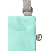 Roka Chelsea Sustainable Nylon Pocket Sling Bag - Capri Turquoise