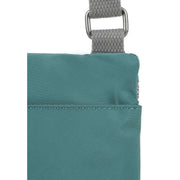 Roka Chelsea Sustainable Nylon Pocket Sling Bag - Sage Green